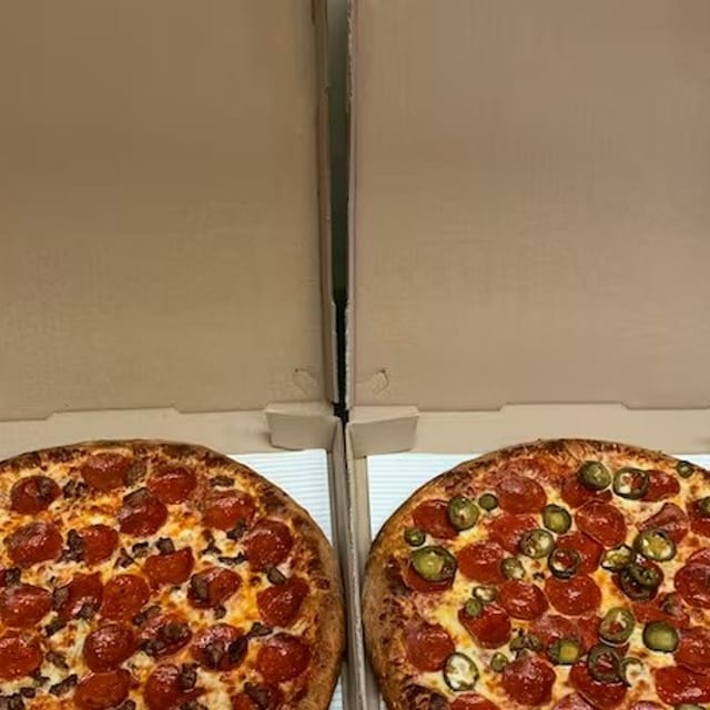 Two Extra Large Pizzas with Two Toppings on Each and an Order of Breadsticks.