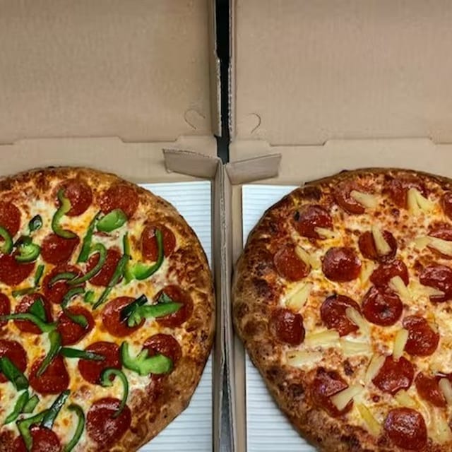 Two Medium Pizzas with Two Toppings on Each.