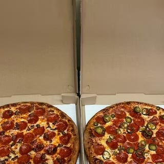 Two Large Pizzas with Two Toppings on Each and an Order of Breadsticks